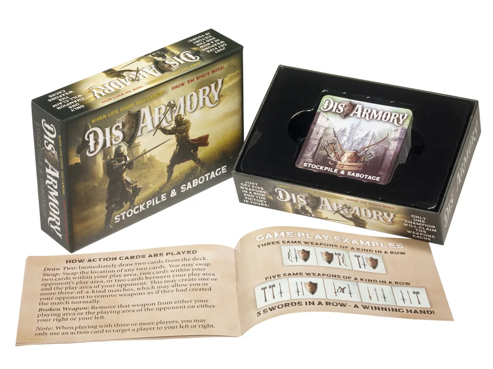 The DisArmory rule book lying open to the setup and gameplay instructions